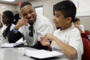 Houston Texans’ Christian Kirksey speaks to kids at the Bob and Renee Parsons Boys and Girls Club.