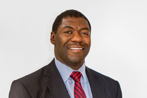 A headshot of Roman Oben, NFL vice president of football development.