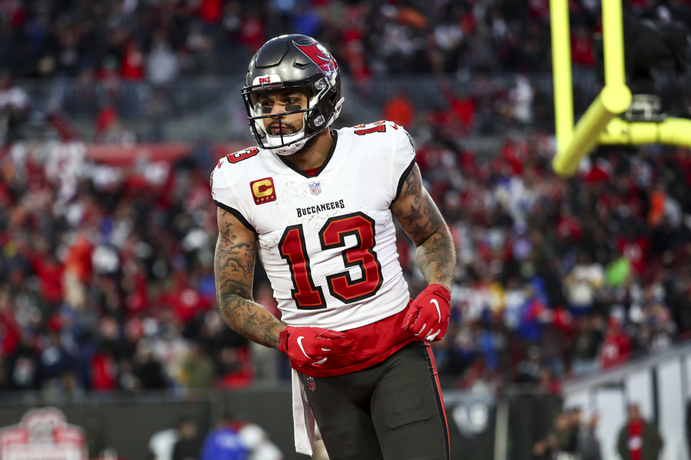 Tampa Bay Buccaneers wide receiver Mike Evans was fined $62,222 for the personal foul penalties and suspended for one game following a scuffle with New Orleans Saints cornerback Marshon Lattimore during the 2022 season. (AP/Kevin Sabitus)